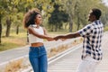 Black african man and women couple lover teen lifestyle living together at park outsoors