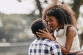 Black african man and women couple lover teen lifestyle living together at park outsoors