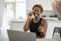 Black African traditional business woman working from home Royalty Free Stock Photo