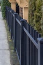 Black Aluminum Fence in city. Iron wrought fence Royalty Free Stock Photo