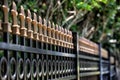 Black Aluminum Fence with gold caps Royalty Free Stock Photo