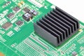 Black Aluminum heatsink on electronics or computer circuit board Royalty Free Stock Photo