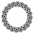 Black animal paw prints round frame. Royalty Free Stock Photo