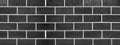 Black anthracite gray grey brick tiles tilework glazed ceramic wall or floor texture wide background banner panorama pattern Royalty Free Stock Photo