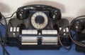 Black antique telephone. Vintage old telephone on desk