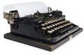 Black antique typewriter, with white blank sheet of paper.