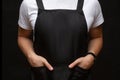 Black apron on a man closeup Royalty Free Stock Photo
