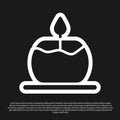 Black Aroma candle icon isolated on black background. Vector