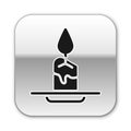 Black Aroma candle icon isolated on white background. Silver square button. Vector