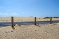 black asphalt road among desert dunes, Corralejo, Fuerteventura, Canary Islands, Spain Royalty Free Stock Photo