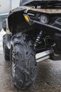 Black ATV quadbike isolated on city pavement, close up Royalty Free Stock Photo