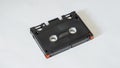 Black audio cassette in elcaset format on white background Royalty Free Stock Photo