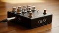 Audio effects pedal with GeFX branding on the body rests on wooden Royalty Free Stock Photo