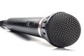 Black audio microphone on a white background Royalty Free Stock Photo