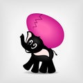 Black baby elephant with pink easter egg Royalty Free Stock Photo