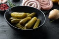 Hommade picled cucumbers  on black background Royalty Free Stock Photo