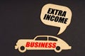 On a black background, a car with the inscription Business, above it a plate with the inscription - Extra Income