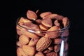 black background in glass almond,almond in glass and beautiful background,close up view of almond,,almond view of close up