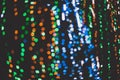 Background of green, blue and orange glitter lights. Defocused Royalty Free Stock Photo