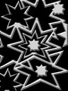 Black background with many grey metal steel stars.