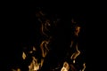 Black background with a pattern of fire and smoke. Background and texture.