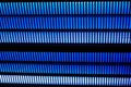 Black background with rows of vivid blue thick lines