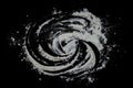 Black background sprinkled with flour, smeared flour, table for cooking, rolling dough.