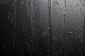 Black background, texture of matte plastic surface with grainy effect, gradient. dark grey backdrop for design and decoration Royalty Free Stock Photo