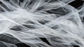 A black background with white, sheer, and flowing fabric.