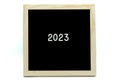 2023 on black wood frame on white background Royalty Free Stock Photo