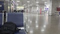 black backpack on chair in Manas airport