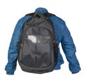 Black backpack dressed in a blue jacket isolated on a white background Royalty Free Stock Photo