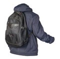 Black backpack dressed in a blue jacket isolated on a white background Royalty Free Stock Photo