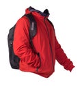 Black backpack dressed in a red jacket isolated on a white background Royalty Free Stock Photo