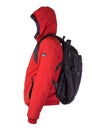 Black backpack dressed in a red jacket isolated on a white background Royalty Free Stock Photo