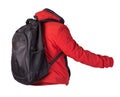 Black backpack dressed in a red jacket isolated on a white background Royalty Free Stock Photo