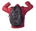 Black backpack dressed in a red jacket isolated on a white background Royalty Free Stock Photo