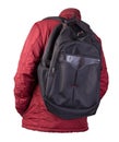Black backpack dressed in a red jacket isolated on a white background Royalty Free Stock Photo