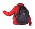 Black backpack dressed in a red jacket isolated on a white background Royalty Free Stock Photo
