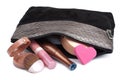 Black bag with cosmetics isolated