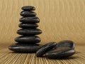 Black balancing stones standing on bamboo background. 3D illustration