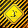 Black Bare tree icon isolated on yellow background. Warning sign. Vector