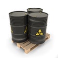 Black barrels with toxic materials on the pallet Royalty Free Stock Photo