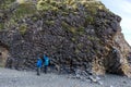 Black basalt cliffs sub-vertical polygonal columns and columnar joints