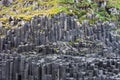 Black basalt columns of Reynisfjara look like huge pencils, a world-famous black-sand beach found on the South Coast of Royalty Free Stock Photo