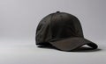 Black Baseball Cap Mockup on Grey Background with Copy Space Royalty Free Stock Photo