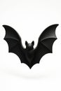 Black bat sculpture on white background Royalty Free Stock Photo