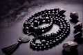 Black beads Muslim prayer rosary on dark stone. Generative AI, Generative, AI