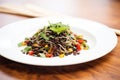 black bean pasta on a white plate