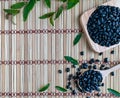 Black beans in a wooden spoon on a wooden mat,properties help to detoxify and nourish the kidneys well. Due to the presence of Royalty Free Stock Photo